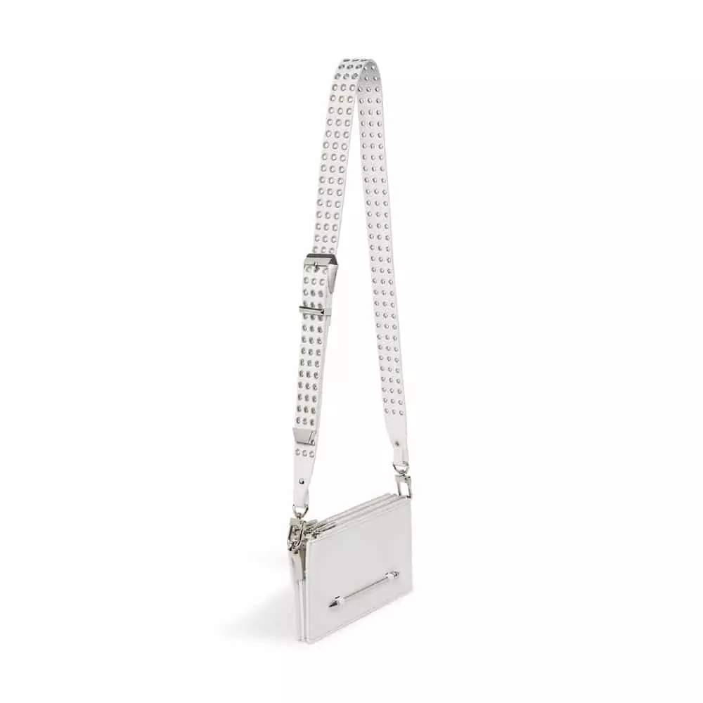 --Pierced cross body white bag-